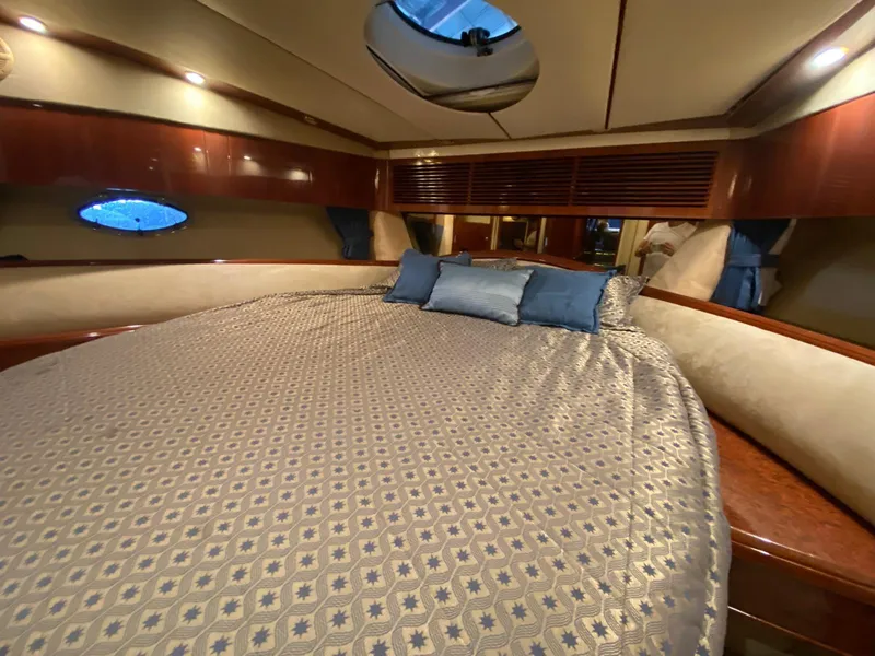 Slide: The Image of Luxurious cabin interior of 2001 Fairline Squadron 55 yacht with elegant bedding. - 29