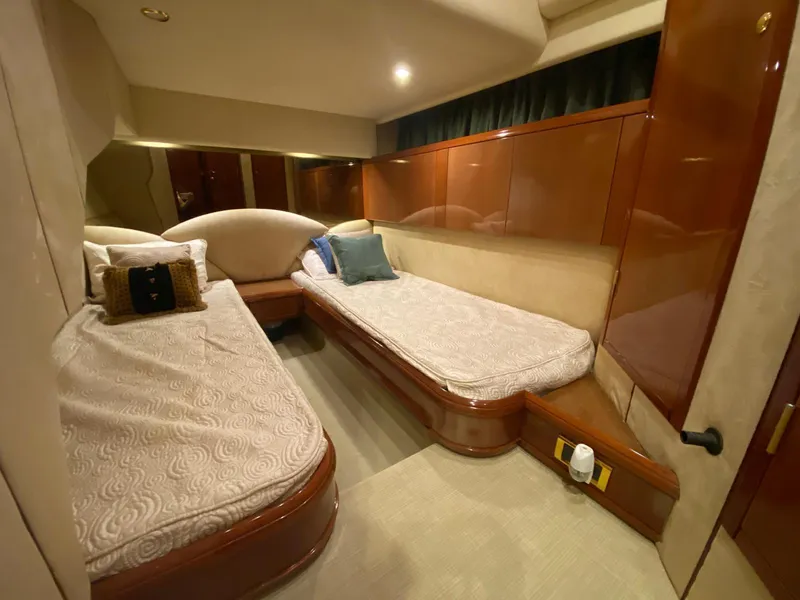 Slide: The Image of Luxurious cabin interior of 2001 Fairline Squadron 55 yacht with twin beds. - 30