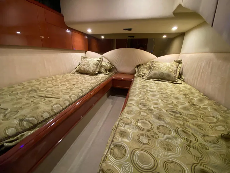 Slide: The Image of Luxurious cabin interior of 2001 Fairline Squadron 55 yacht with twin beds. - 31