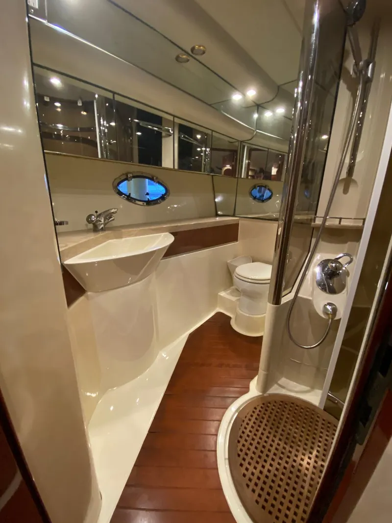 Slide: The Image of 2001 Fairline Squadron 55 yacht bathroom with modern fixtures and wooden flooring. - 33