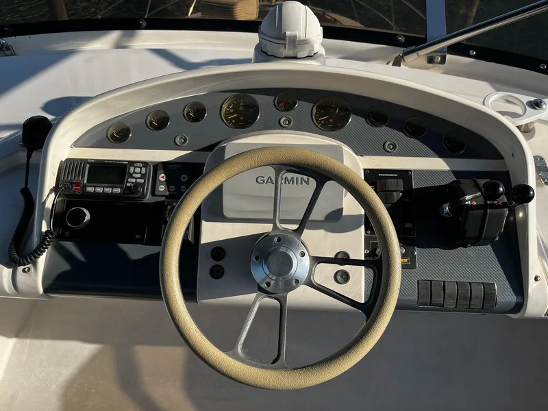 Slide: The Image of Steering console of 2001 Fairline Squadron 55 yacht with Garmin navigation system. - 7