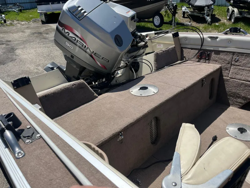 Slide: The Image of 1997 Smoker Craft 170 PHANTOM boat with Mariner outboard motor, interior view. - 4
