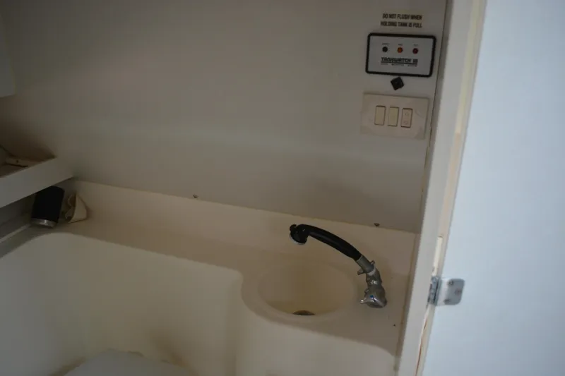 Slide: The Image of 1997 Cruisers Yachts 3120 Aria interior sink and control panel. - 29