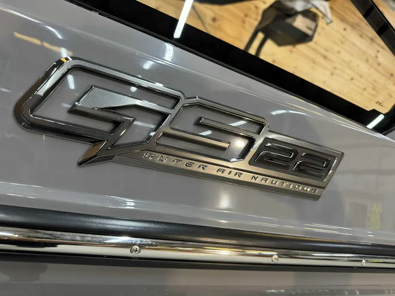Slide: The Image of 2025 Nautique GS22 boat emblem, showcasing sleek design and branding. - 5