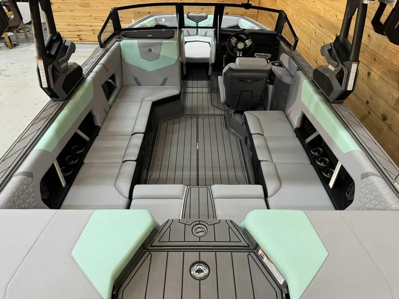 Slide: The Image of 2025 Nautique GS22 boat interior with sleek seating and modern design. - 6