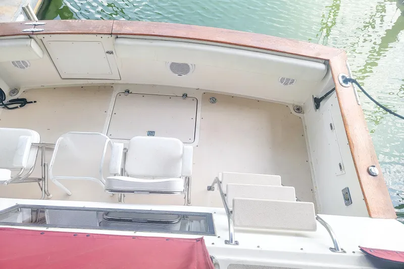 Slide: The Image of 1984 Wellcraft 44 Californian CMY boat deck with seating and water view. - 14