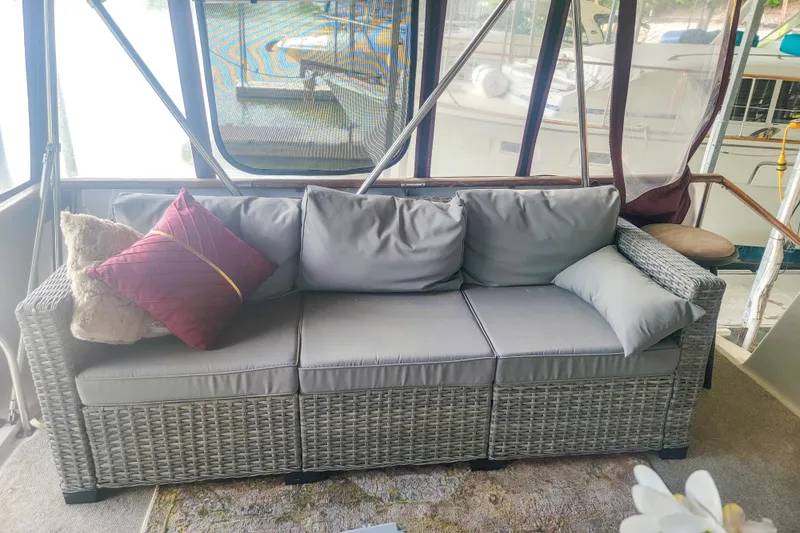 Slide: The Image of Gray wicker sofa with cushions on 1984 Wellcraft 44 Californian CMY yacht. - 18