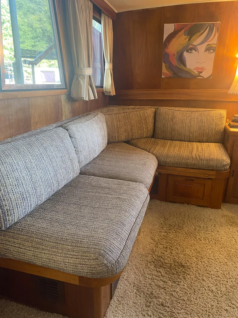 Slide: The Image of 1984 Wellcraft 44 Californian CMY interior with cozy seating and modern artwork. - 40
