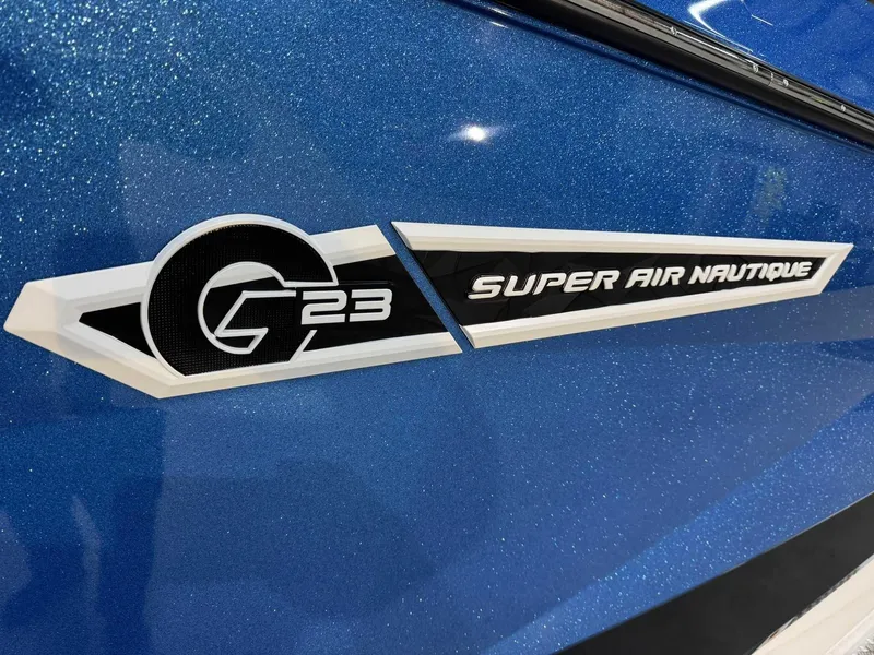 Slide: The Image of 2025 Nautique G23 Super Air logo on sparkling blue surface. - 5
