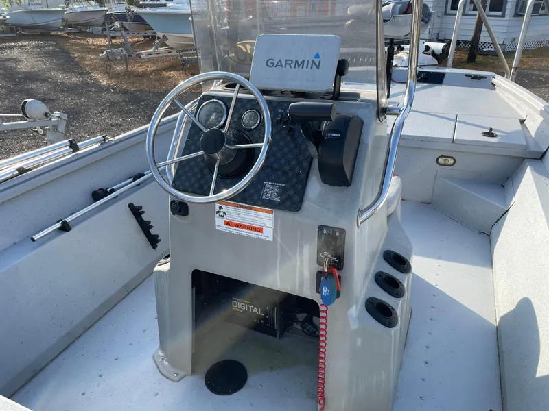 Slide: The Image of Center console of a 2018 G3 Deluxe 18 boat with Garmin navigation system. - 8