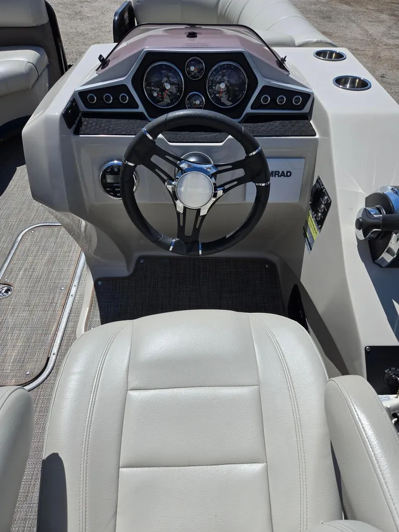 Slide: The Image of 2019 Manitou Oasis VP Tri Toon dashboard with steering wheel and gauges. - 8