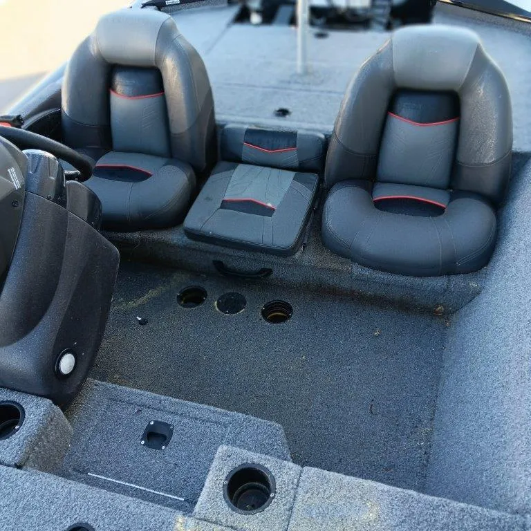 Slide: The Image of 2022 Tracker Pro Team 175 TXW boat interior with dual seats and steering console. - 10