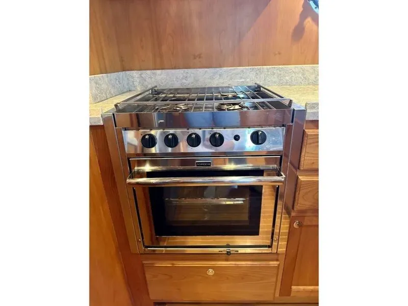 Slide: The Image of Stainless steel oven and stove in 2019 Kadey-Krogen 44AE yacht kitchen. - 23
