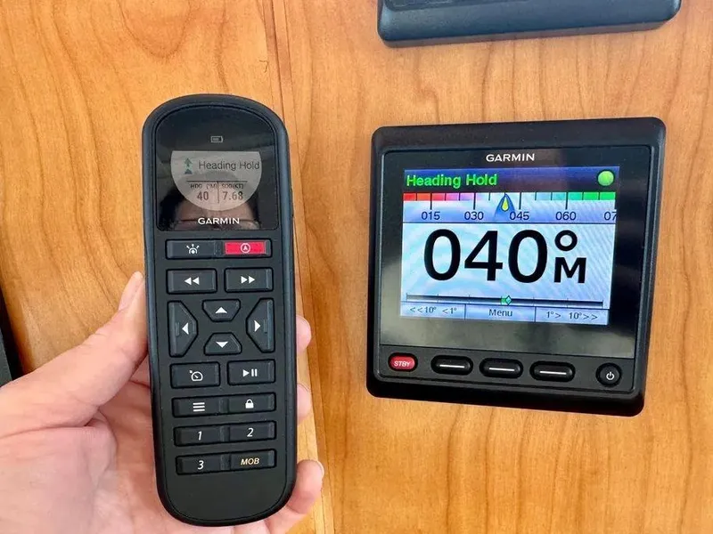 Slide: The Image of Garmin navigation controls on Kadey-Krogen 44AE, 2019 model, showing heading hold at 040 degrees. - 31