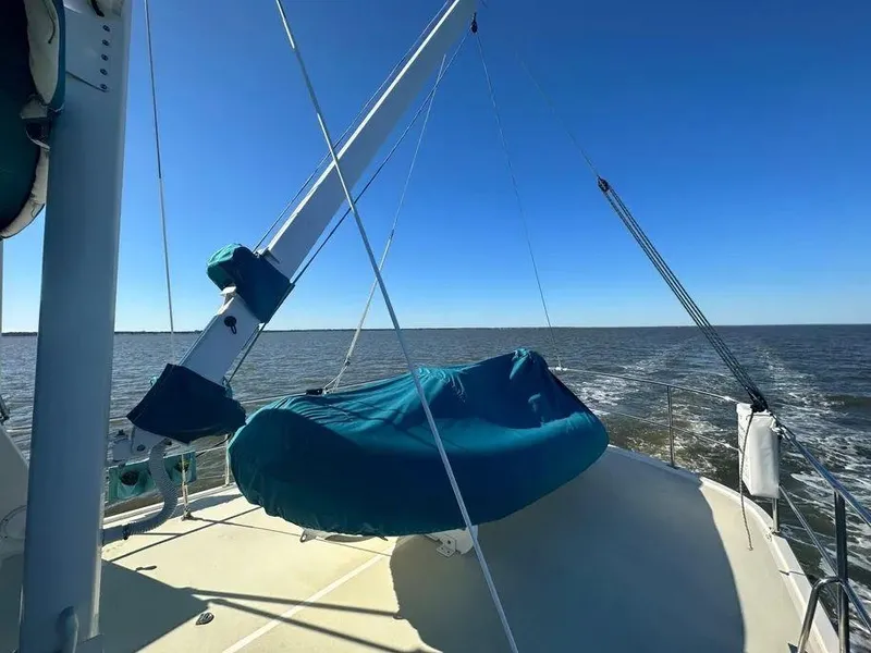 Slide: The Image of Kadey-Krogen 44AE 2019 yacht deck with blue cover, ocean view, clear sky. - 47