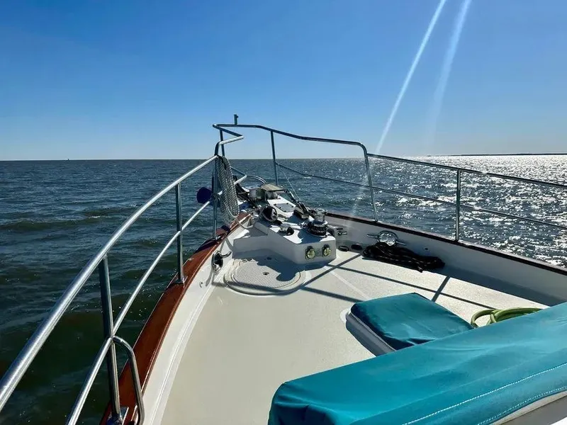 Slide: The Image of Kadey-Krogen 44AE 2019 yacht deck with ocean view and clear blue sky. - 50