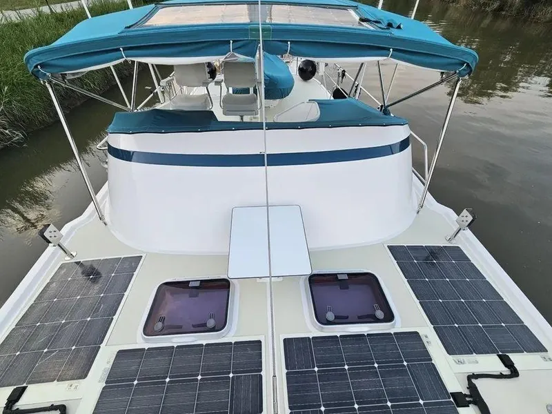 Slide: The Image of Kadey-Krogen 44AE 2019 yacht with solar panels and blue canopy on deck. - 55