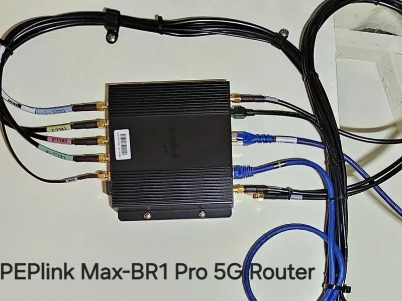 Slide: The Image of PEPlink Max-BR1 Pro 5G Router with multiple connected cables, Kadey-Krogen 44AE 2019. - 58
