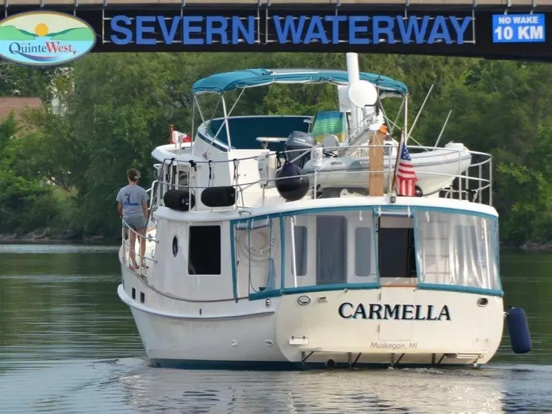 Slide: The Image of Kadey-Krogen 44AE 2019 yacht "Carmella" cruising under Severn Waterway bridge. - 6