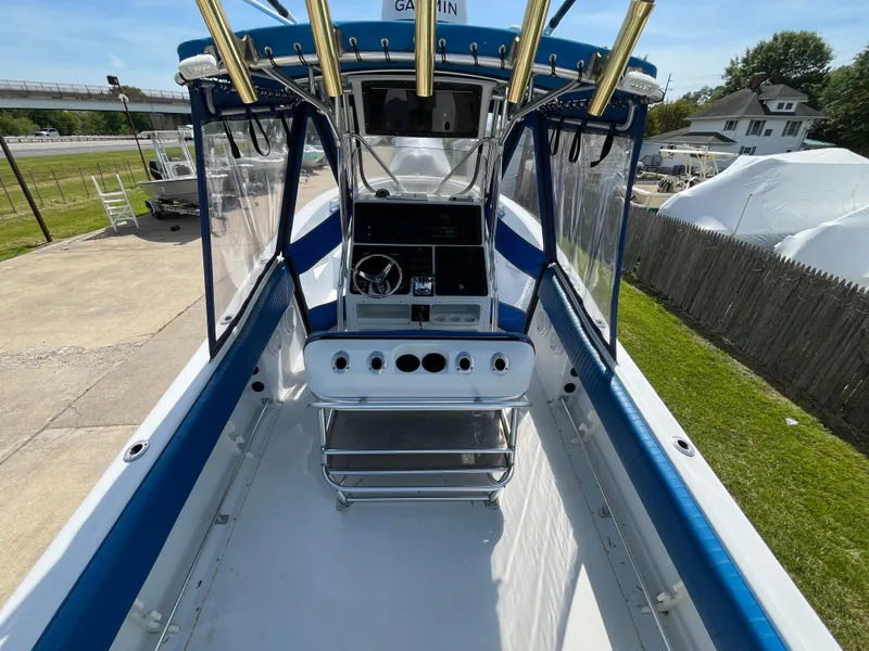 Slide: The Image of 2000 Hydra-Sports 2796 Vector boat interior with steering console and blue accents. - 7
