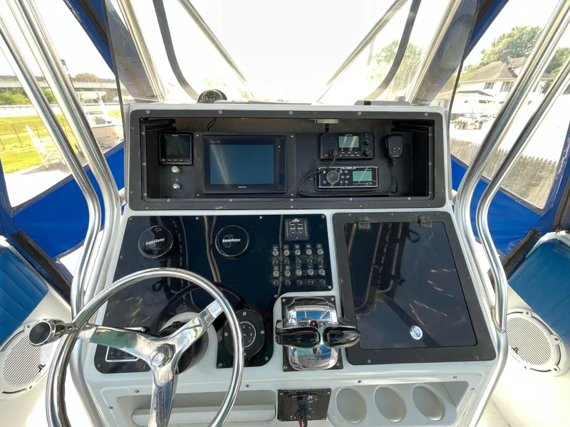 Slide: The Image of Helm of 2000 Hydra-Sports 2796 Vector boat with navigation equipment and steering wheel. - 8
