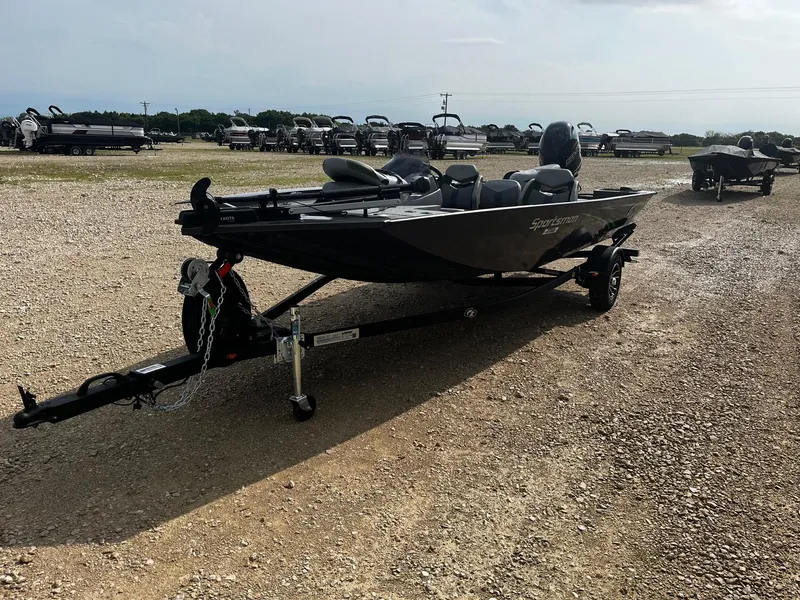 Slide: The Image of 2025 G3 Sportsman 1710 PFX boat on trailer in outdoor setting. - 3