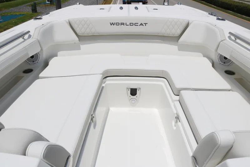 Slide: The Image of 2025 World Cat 280 DC boat interior with white seating and spacious layout. - 8