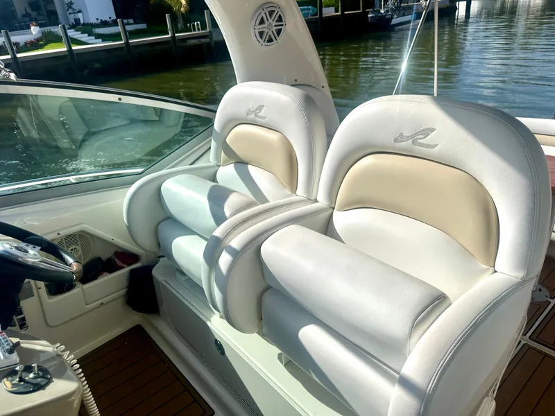 Slide: The Image of Luxury seating on 2008 Sea Ray 420 Sundancer yacht, featuring plush white upholstery. - 33