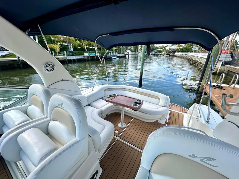 Slide: The Image of 2008 Sea Ray 420 Sundancer yacht with luxurious seating and waterfront view. - 36