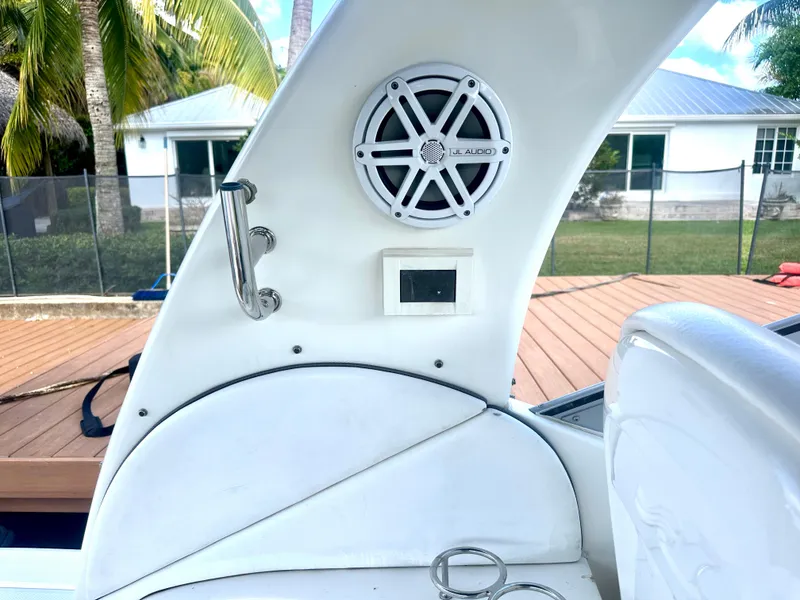Slide: The Image of 2008 Sea Ray 420 Sundancer boat interior with speaker and control panel. - 46
