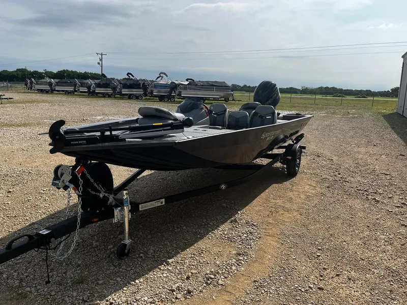 Slide: The Image of 2025 G3 Sportsman 1810 PFX boat on trailer, parked outdoors on gravel. - 3