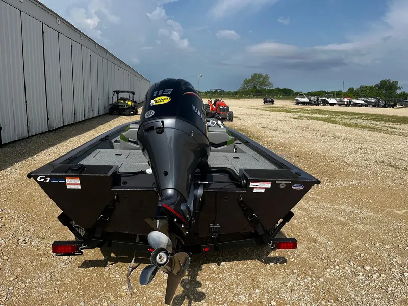 Slide: The Image of 2025 G3 Sportsman 1810 PFX boat with powerful outboard motor in a sunny outdoor setting. - 6