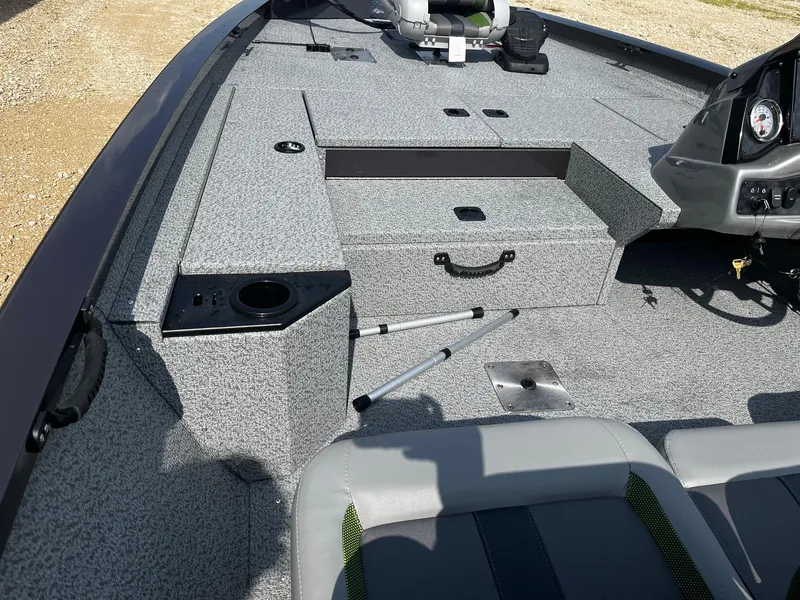 Slide: The Image of 2025 G3 Sportsman 1810 PFX boat interior with seating and storage compartments. - 9