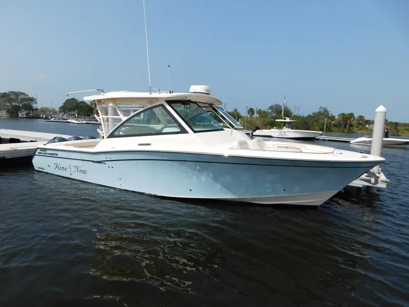 The Image of 2018 Grady-White Freedom 375 boat docked on calm water. - 0