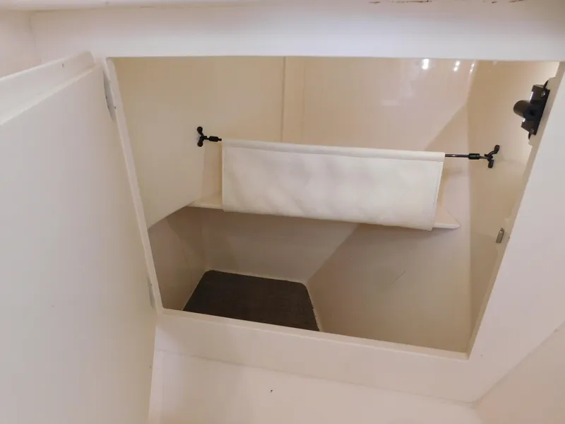 Slide: The Image of Storage compartment inside a 2018 Grady-White Freedom 375 boat. - 16