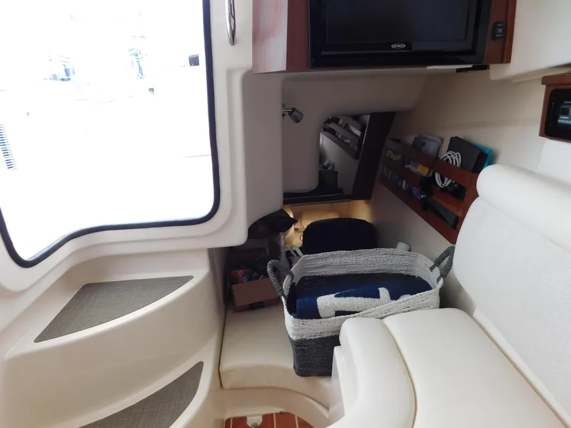 Slide: The Image of Interior of 2018 Grady-White Freedom 375 boat with seating and storage basket. - 22