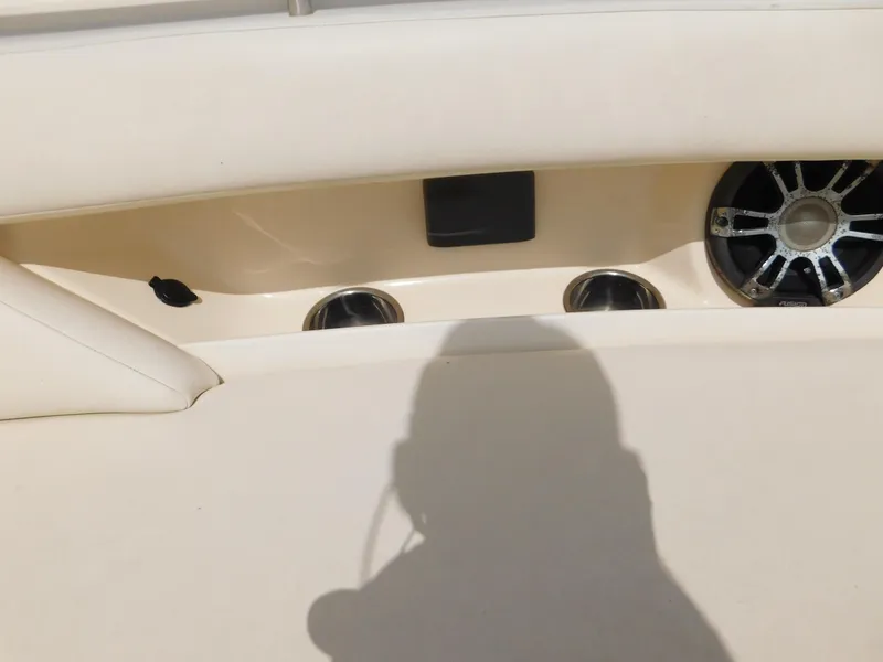 Slide: The Image of 2018 Grady-White Freedom 375 boat interior with speaker and cup holders. - 33