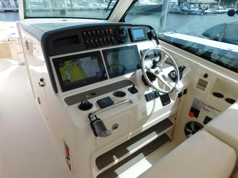 Slide: The Image of 2018 Grady-White Freedom 375 helm with advanced navigation and control systems. - 34