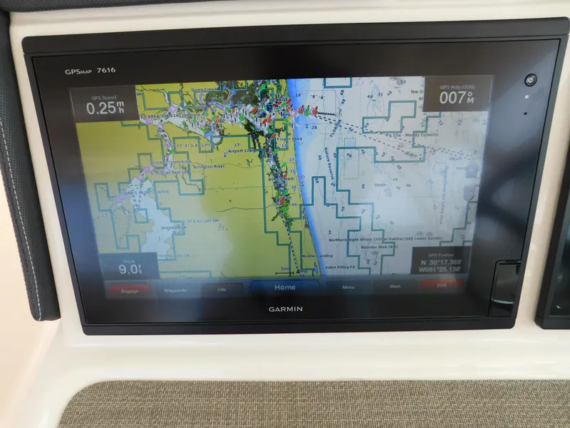 Slide: The Image of Garmin GPS display on 2018 Grady-White Freedom 375 boat, showing navigational map. - 35