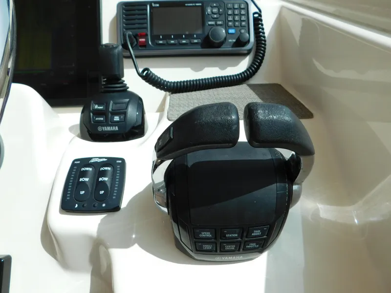 Slide: The Image of Control panel of 2018 Grady-White Freedom 375 boat with Yamaha throttle and radio. - 43
