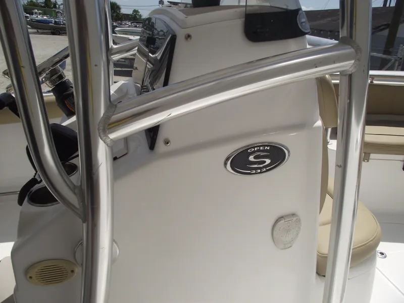 Slide: The Image of 2016 Sportsman Open 232 Center Console boat interior with steering console and seating. - 37