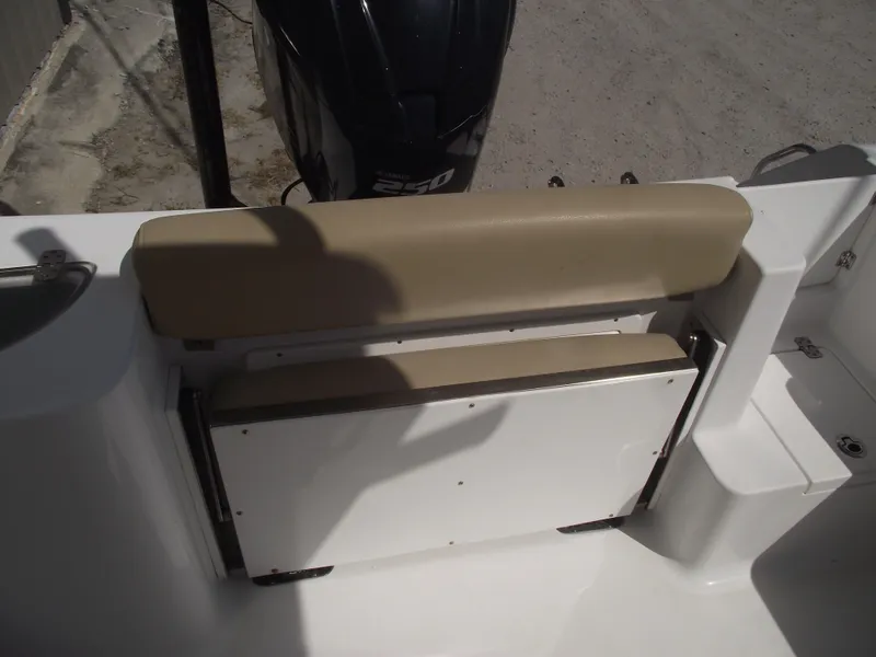Slide: The Image of 2016 Sportsman Open 232 Center Console boat seat and engine detail. - 45