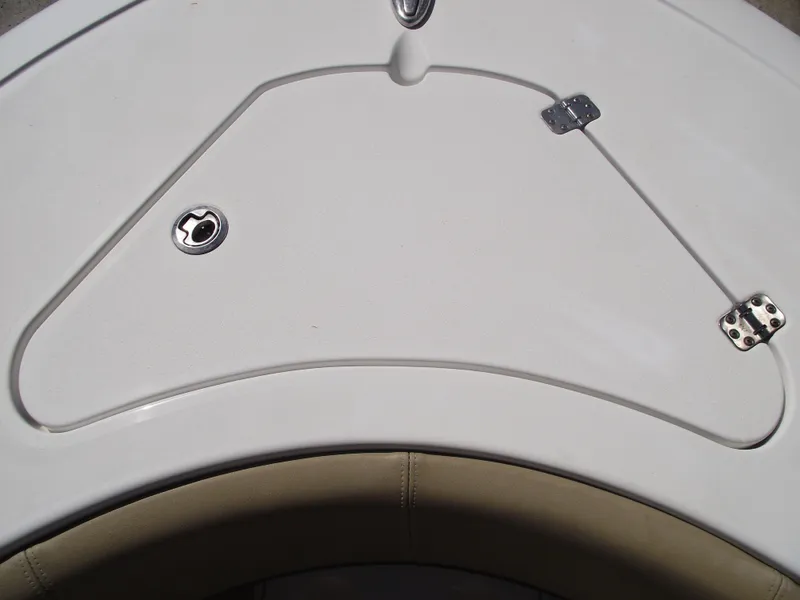 Slide: The Image of 2016 Sportsman Open 232 Center Console boat hatch with hinges and latch. - 9