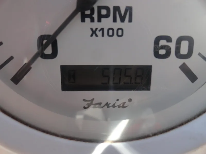 Slide: The Image of RPM gauge reading 505.8 on a 2003 Cobra 270 Razor Mid-Cabin Open Bow. - 9