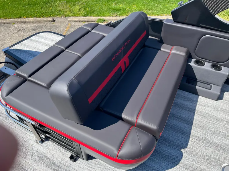 Slide: The Image of 2025 Bennington M Line boat seating with sleek gray and red design. - 21