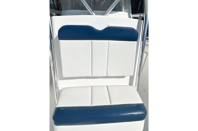Slide: The Image of White and blue seating on 2013 Buddy Davis 34 Center Console boat. - 22