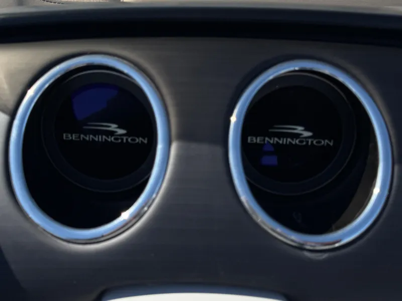 Slide: The Image of Dashboard of 2020 Bennington Q 25 QSR with dual circular displays. - 10