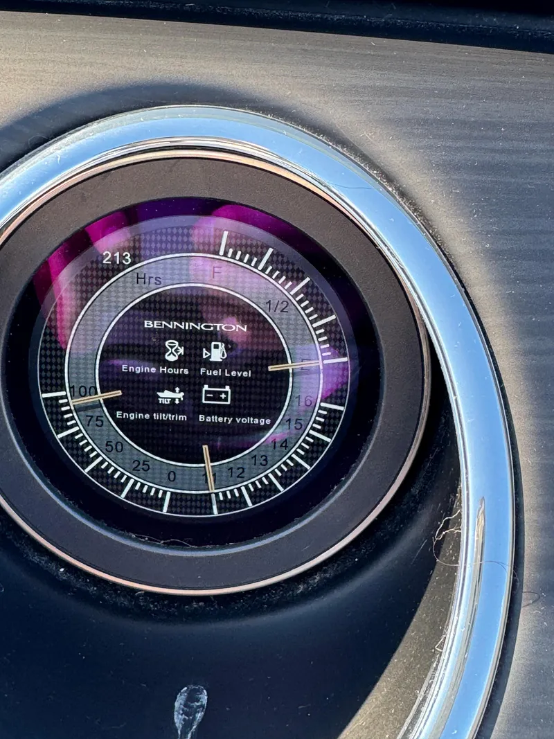 Slide: The Image of Dashboard of 2020 Bennington Q 25 QSR showing engine hours and fuel level. - 11