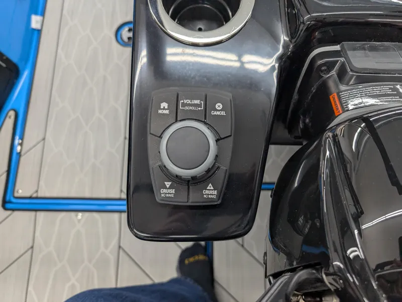 Slide: The Image of Control panel of 2023 Yamaha Boats 222XD with navigation and cruise buttons. - 7