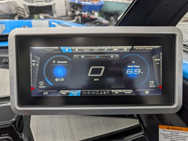 Slide: The Image of Dashboard display of 2023 Yamaha Boats 222XD, showing speed, Bluetooth, and water temperature. - 9